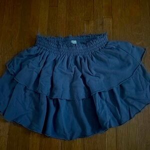 fringe detail around waistband, ruffled bottom, flowy, worn twice